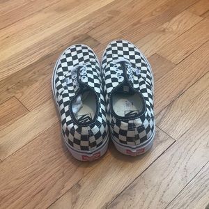 Black and white checkerboard Vans. Men: size 7.5 Women: size 9